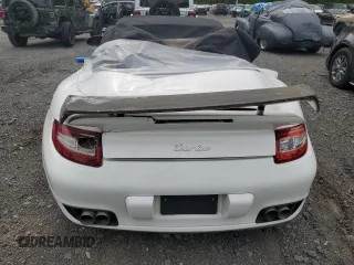 2008 Porsche 911 z VIN WP0CD29958S708310, wystawiony jako Copart lot #57027855 z przebiegiem 13 226 mil mil oraz Nie do naprawy • Non repairable. Historia ofert i sprzedaży dostępna na DreamBid. Obrazek 6.