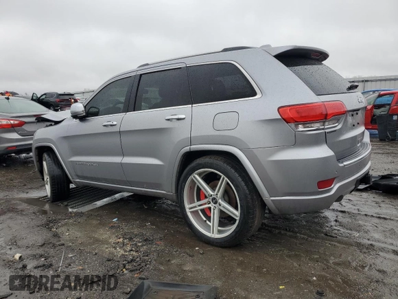 2014 Jeep Grand Cherokee Overland with VIN 1C4RJECG9EC341865, listed as a Copart auction lot 44354615 with 141,601 mi miles and Salvage Title. Bid and sale history available at carsss.com. Image 2.