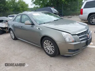 2011 Cadillac CTS Luxury with VIN 1G6DG5EY1B0129122, listed as a IAAI auction lot 42807252 with 104,414 mi miles and . Bid and sale history available at DreamBid. Image 1.