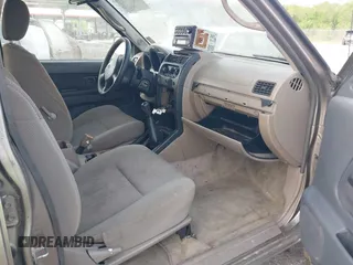 2003 Nissan Frontier XE z VIN 1N6ED27T13C404348, wystawiony jako IAAI lot #41952112 z przebiegiem Nie podano mil oraz . Historia ofert i sprzedaży dostępna na DreamBid. Obrazek 5.