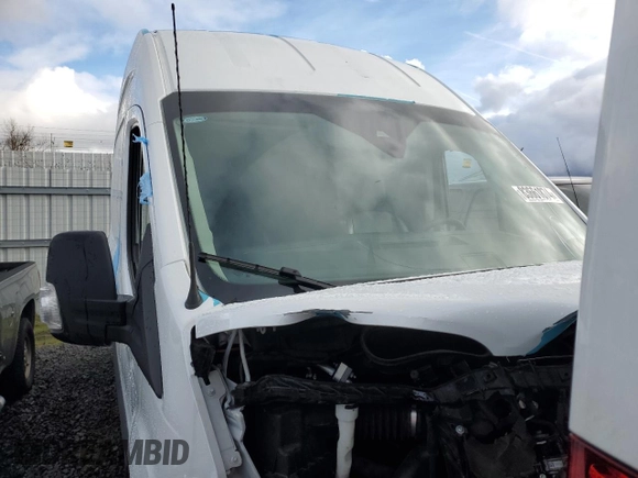 2023 Ford Transit Cargo z VIN 1FTBR1X8XPKB14862, wystawiony jako Copart lot #83661874 z przebiegiem Nie podano mil oraz Szkoda całkowita • Salvage title. Historia ofert i sprzedaży dostępna na DreamBid. Obrazek 5.