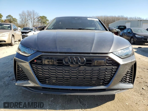 2022 Audi RS 7 z VIN WUAPCBF22NN912345, wystawiony jako Copart lot #41202044 z przebiegiem 5076 mil mil oraz Szkody całkowita. Historia ofert i sprzedaży dostępna na DreamBid. Obrazek 5.