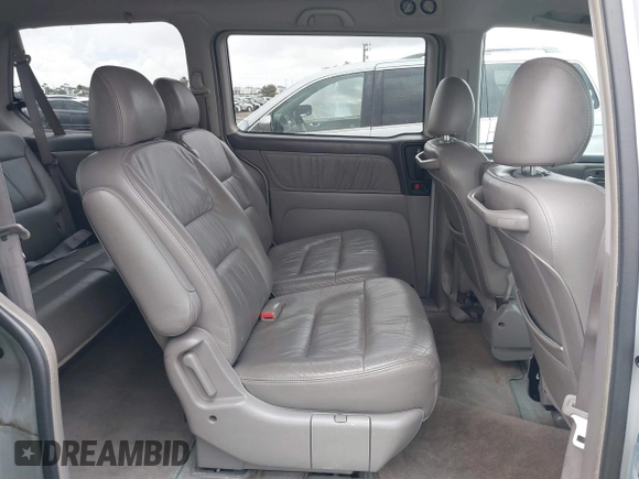 2003 Honda Odyssey EX-L z VIN 5FNRL18033B096575, wystawiony jako IAAI lot #41576926 z przebiegiem 210 932 mil mil oraz . Historia ofert i sprzedaży dostępna na DreamBid. Obrazek 8.