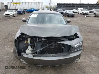 2010 Dodge Charger SXT with VIN 2B3CA3CV7AH165769, listed as a IAAI auction lot 42038135 with 200,886 mi miles. Bid and sale history available at carsss.com. Image 13.