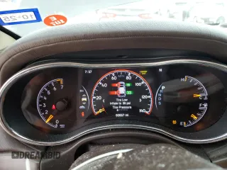 2014 Jeep Grand Cherokee Overland with VIN 1C4RJFCG9EC572237, listed as a Copart auction lot 53864865 with 90,657 mi miles and Salvage Title. Bid and sale history available at DreamBid. Image 9.