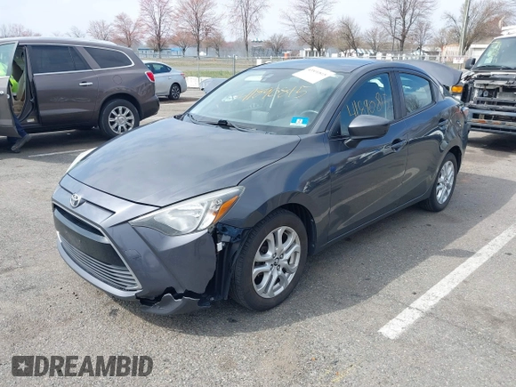 2018 Toyota Yaris with VIN 3MYDLBYV2JY321213, listed as a IAAI auction lot 41890815 with 94,089 mi miles and . Bid and sale history available at DreamBid. Image 2.