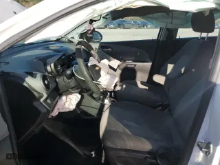 2014 Chevrolet Sonic LS with VIN 1G1JA6SH3E4170398, listed as a Copart auction lot 50381315 with 140,238 mi miles and Salvage Title. Bid and sale history available at carsss.com. Image 7.