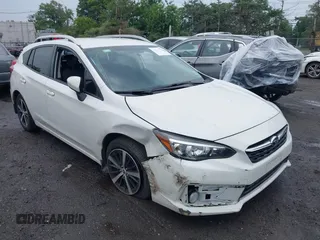 2022 Subaru Impreza Premium with VIN 4S3GTAV61N3714721, listed as a IAAI auction lot 42642070 with 19,818 mi miles and . Bid and sale history available at DreamBid. Image 1.
