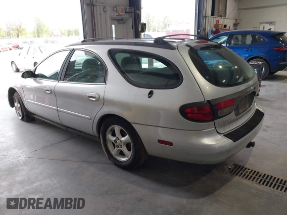 2001 Ford Taurus SE Standard with VIN 1FAFP58U91G202523, listed as a IAAI auction lot 42092190 with 197,961 mi miles. Bid and sale history available at carsss.com. Image 3.