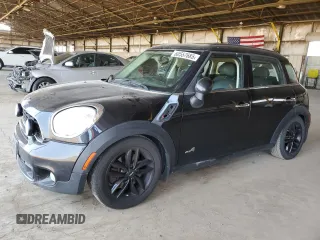 2011 MINI Countryman S with VIN WMWZC5C54BWM10218, listed as a Copart auction lot 60557685 with 192,422 mi miles and Salvage title. Bid and sale history available at DreamBid. Image 1.