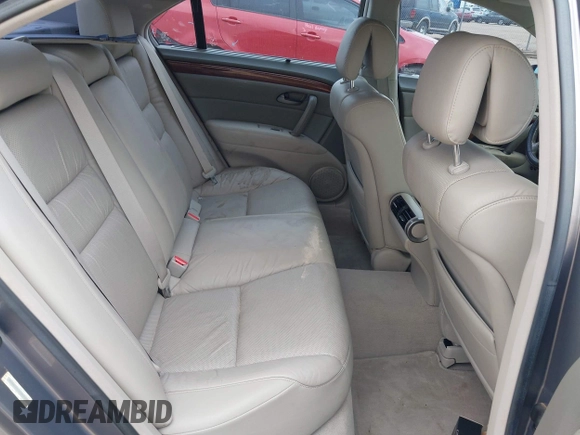 2006 Acura RL z VIN JH4KB16526C006190, wystawiony jako IAAI lot #42351400 z przebiegiem 150 749 mil mil oraz . Historia ofert i sprzedaży dostępna na DreamBid. Obrazek 8.