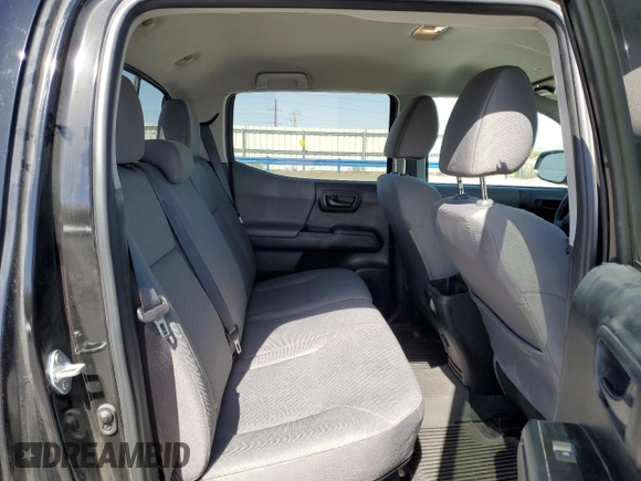 2023 Toyota Tacoma SR z VIN 3TMCZ5AN1PM643457, wystawiony jako Copart lot #51304985 z przebiegiem 9 673 mil mil oraz Szkoda całkowita • Salvage title. Historia ofert i sprzedaży dostępna na DreamBid. Obrazek 12.