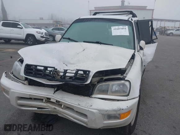 1999 Toyota RAV4 with VIN JT3GP10V0X7050334, listed as a IAAI auction lot 41607894 with 348,069 mi miles and . Bid and sale history available at DreamBid. Image 17.