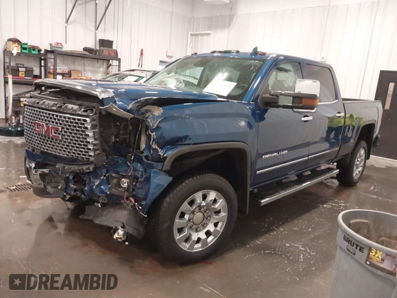 2015 GMC Sierra 2500HD Denali z VIN 1GT120E86FF655301, wystawiony jako IAAI lot #41965001 z przebiegiem 74 136 mil mil oraz . Historia ofert i sprzedaży dostępna na DreamBid. Obrazek 20.