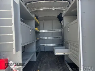 2023 Ford Transit Cargo with VIN 1FTBR1X82PKC02353, listed as a IAAI auction lot 42878842 with 25,863 mi miles and . Bid and sale history available at DreamBid. Image 2.
