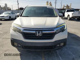 2017 Honda Ridgeline RTL-T with VIN 5FPYK2F65HB011097, listed as a Copart auction lot 63687965 with 186,157 mi miles and Salvage title. Bid and sale history available at DreamBid. Image 5.