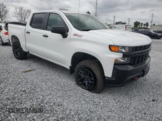 2022 Chevrolet Silverado 1500 Custom Trail Boss with VIN 1GCPYCEL0NZ140337, listed as a Copart auction lot 47146235 with 51,913 mi miles and Salvage Title. Bid and sale history available at DreamBid. Image 4.