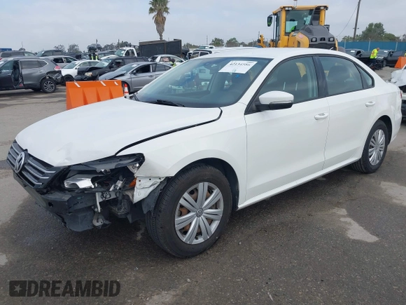 2014 Volkswagen Passat S with VIN 1VWAS7A34EC120855, listed as a IAAI auction lot 42134586 with 61,825 mi miles and . Bid and sale history available at DreamBid. Image 2.