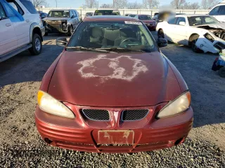 2001 Pontiac Grand Am SE1 with VIN 1G2NF52T91M517918, listed as a Copart auction lot 88164755 with 135,944 mi miles and Salvage Title. Bid and sale history available at carsss.com. Image 5.