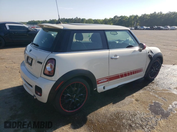 2012 MINI Hardtop with VIN WMWSU3C53CT369974, listed as a Copart auction lot 53238895 with 130,734 mi miles and Salvage Title. Bid and sale history available at DreamBid. Image 3.
