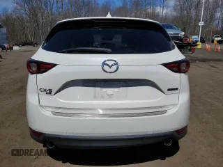 2020 Mazda CX-5 Grand Touring with VIN JM3KFBDM9L1803881, listed as a Copart auction lot 52822395 with 49,604 mi miles and Salvage Title. Bid and sale history available at carsss.com. Image 6.