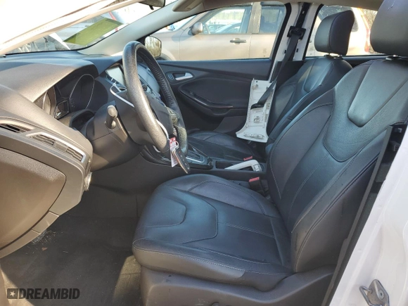 2015 Ford Focus Titanium with VIN 1FADP3N25FL325037, listed as a Copart auction lot 42248985 with 58,831 mi miles and Salvage Title. Bid and sale history available at carsss.com. Image 7.