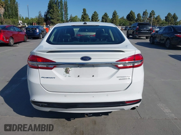 2017 Ford Fusion Hybrid Titanium с VIN 3FA6P0RU3HR323164, выставлен на аукционе IAAI как лот 42303571 с пробегом 119 732 миль миль и . История ставок и продаж доступна на DreamBid. Изображение 17.