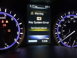 2015 Infiniti Q50 Premium z VIN JN1BV7ARXFM418280, wystawiony jako IAAI lot #42080879 z przebiegiem 126 411 mil mil oraz . Historia ofert i sprzedaży dostępna na DreamBid. Obrazek 7.