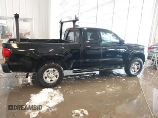 2023 Toyota Tacoma SR with VIN 3TYRX5GN2PT069110, listed as a IAAI auction lot 41235858 with 60,019 mi miles and . Bid and sale history available at DreamBid. Image 13.