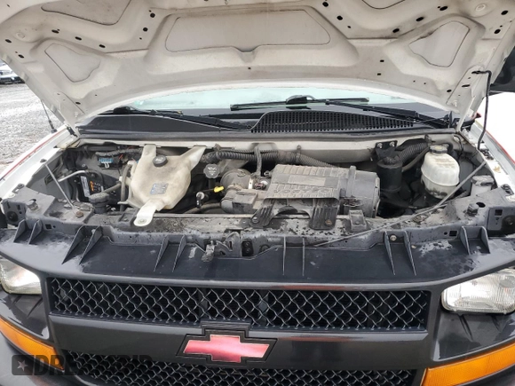 2012 Chevrolet Express Cargo z VIN 1GCWGFCAXC1165369, wystawiony jako Copart lot #60208784 z przebiegiem 199 099 mil mil oraz Szkoda całkowita • Salvage title. Historia ofert i sprzedaży dostępna na DreamBid. Obrazek 12.