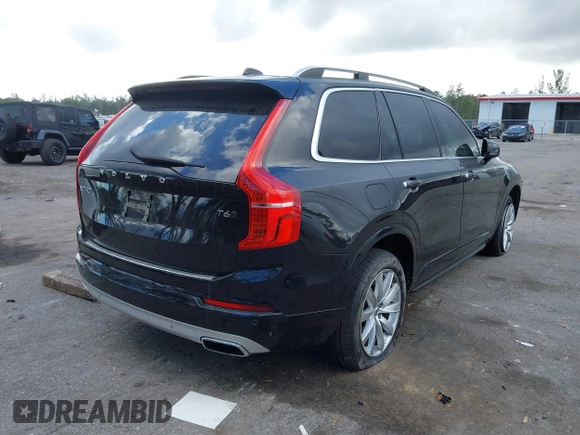 2017 Volvo XC90 Momentum with VIN YV4A22PK7H1110760, listed as a IAAI auction lot 41528500 with 97,610 mi miles. Bid and sale history available at carsss.com. Image 4.