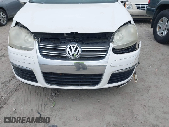 2009 Volkswagen Jetta Sedan SE with VIN 3VWRM71K99M068342, listed as a IAAI auction lot 41876215 with 161,633 mi miles. Bid and sale history available at carsss.com. Image 6.