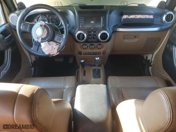 2011 Jeep Wrangler Unlimited Sahara with VIN 1J4BA5H10BL558961, listed as a Copart auction lot 74806494 with 172,855 mi miles and Salvage Title. Bid and sale history available at carsss.com. Image 8.