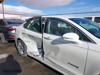 2015 Ford Fusion Titanium Hybrid with VIN 3FA6P0RU9FR308973, listed as a IAAI auction lot 41754320 with 82,686 mi miles. Bid and sale history available at carsss.com. Image 6.