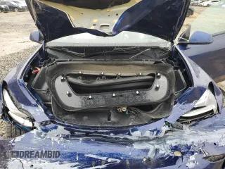 2022 Tesla Model Y Long Range z VIN 7SAYGDEE6NF318808, wystawiony jako Copart lot #57219915 z przebiegiem Nie podano mil oraz Szkoda całkowita • Salvage title. Historia ofert i sprzedaży dostępna na DreamBid. Obrazek 11.