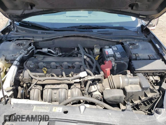 2012 Ford Fusion SE z VIN 3FAHP0HA7CR306411, wystawiony jako Copart lot #60476635 z przebiegiem 173 779 mil mil oraz Szkoda całkowita • Salvage title. Historia ofert i sprzedaży dostępna na DreamBid. Obrazek 11.