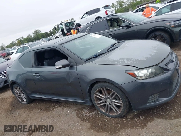 2012 Scion tC z VIN JTKJF5C74C3040019, wystawiony jako IAAI lot #42418457 z przebiegiem 160 579 mil mil oraz . Historia ofert i sprzedaży dostępna na DreamBid. Obrazek 6.