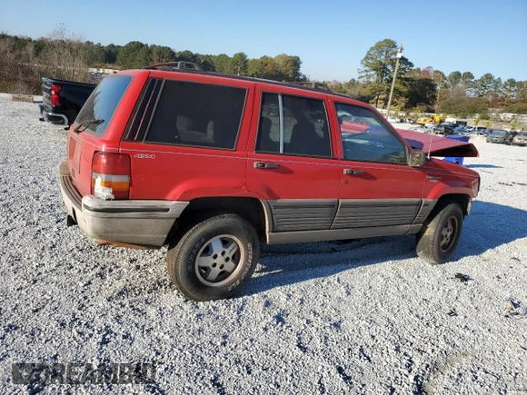 1995 Jeep Grand Cherokee Laredo with VIN 1J4GZ58S7SC747906, listed as a Copart auction lot 82529374 with 73,932 mi miles and Salvage Title. Bid and sale history available at carsss.com. Image 3.