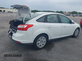2012 Ford Focus SE with VIN 1FAHP3F25CL239383, listed as a IAAI auction lot 41656033 with 127,011 mi miles and . Bid and sale history available at DreamBid. Image 4.