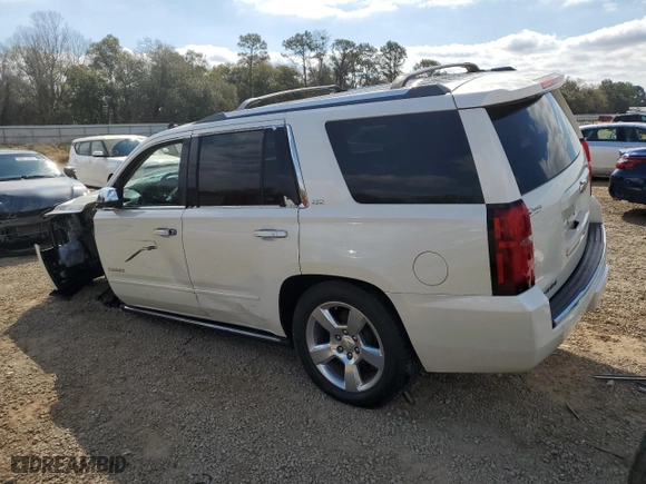 2015 Chevrolet Tahoe LTZ with VIN 1GNSCCKCXFR102314, listed as a Copart auction lot 48479825 with 218,901 mi miles and Salvage Title. Bid and sale history available at carsss.com. Image 2.
