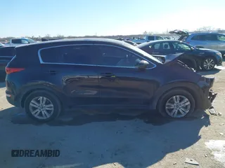 2019 Kia Sportage LX with VIN KNDPM3AC4K7534271, listed as a IAAI auction lot 41696261 with 71,386 mi miles. Bid and sale history available at carsss.com. Image 13.
