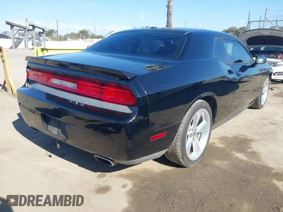 2014 Dodge Challenger R/T z VIN 2C3CDYBT2EH313789, wystawiony jako IAAI lot #42020945 z przebiegiem 182 788 mil mil oraz . Historia ofert i sprzedaży dostępna na DreamBid. Obrazek 4.
