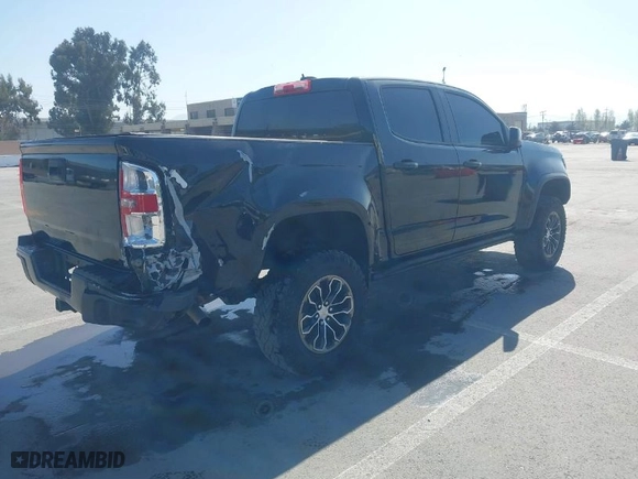 2021 Chevrolet Colorado 4WD ZR2 with VIN 1GCGTEEN6M1169379, listed as a IAAI auction lot 42093827 with 34,489 mi miles. Bid and sale history available at carsss.com. Image 4.