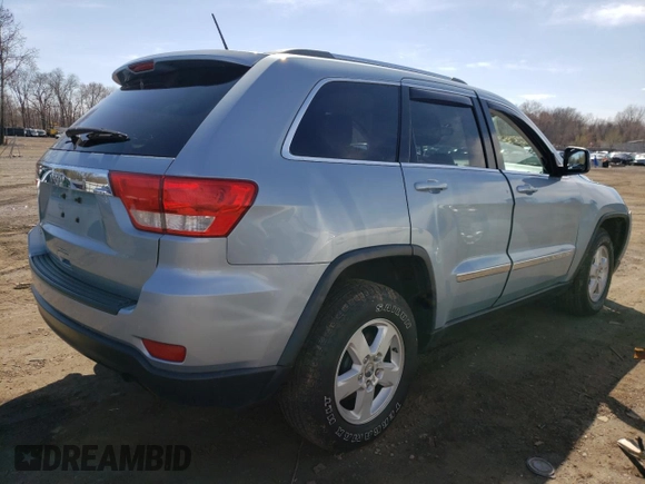 2012 Jeep Grand Cherokee Laredo with VIN 1C4RJFAG5CC222569, listed as a Copart auction lot 53264185 with 153,921 mi miles and Salvage Title. Bid and sale history available at carsss.com. Image 3.