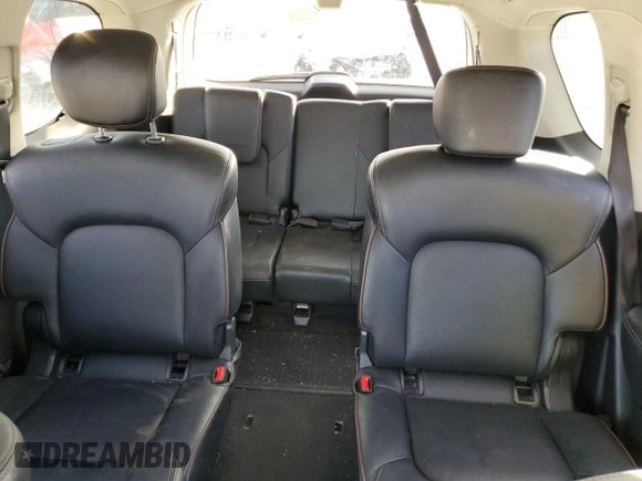 2019 Nissan Armada Platinum with VIN JN8AY2NE1K9759322, listed as a Copart auction lot 71734094 with 59,315 mi miles and Salvage Title. Bid and sale history available at carsss.com. Image 10.