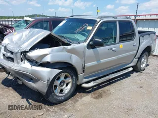 2003 Ford Explorer Sport Trac XLS z VIN 1FMZU67E13UA18239, wystawiony jako IAAI lot #39808663 z przebiegiem 176 641 mil mil oraz . Historia ofert i sprzedaży dostępna na DreamBid. Obrazek 2.