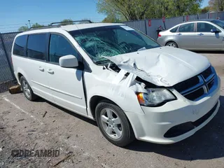 2012 Dodge Grand Caravan SXT with VIN 2C4RDGCGXCR365194, listed as a IAAI auction lot 42058530 with 131,059 mi miles and . Bid and sale history available at DreamBid. Image 1.