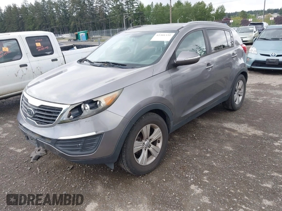 2012 Kia Sportage LX with VIN KNDPB3A22C7262656, listed as a IAAI auction lot 42301331 with 180,743 mi miles and . Bid and sale history available at DreamBid. Image 2.