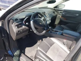 2014 Chevrolet Impala LT with VIN 1G1125S30EU118979, listed as a IAAI auction lot 40084364 with 145,015 mi miles and . Bid and sale history available at DreamBid. Image 5.