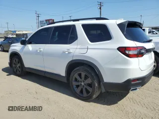 2023 Honda Pilot Sport with VIN 5FNYG2H30PB012041, listed as a Copart auction lot 62038135 with 30,558 mi miles and Salvage title. Bid and sale history available at DreamBid. Image 2.